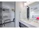 Bathroom with a vanity, a walk-in closet, and shelves at 282 E Maulding Ave, Las Vegas, NV 89123