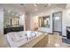 Spa-like bathroom featuring a large tub and walk-in shower at 282 E Maulding Ave, Las Vegas, NV 89123