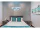 Bedroom with queen bed and a sparkly accent wall at 282 E Maulding Ave, Las Vegas, NV 89123