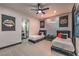 Two twin beds in a contemporary bedroom with unique wall art at 282 E Maulding Ave, Las Vegas, NV 89123