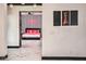 Luxurious bedroom with a king-size bed and red accents at 282 E Maulding Ave, Las Vegas, NV 89123