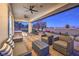 Covered patio with seating area and view of the backyard at 282 E Maulding Ave, Las Vegas, NV 89123