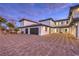 Two-car garage and paved courtyard at 282 E Maulding Ave, Las Vegas, NV 89123