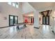 Open game room with a pool table and marble floors at 282 E Maulding Ave, Las Vegas, NV 89123
