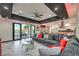 Open concept living room with a view of the pool and kitchen at 282 E Maulding Ave, Las Vegas, NV 89123