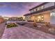 Spacious patio with seating area and giant chess set at 282 E Maulding Ave, Las Vegas, NV 89123