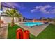 Stunning pool and spa with artificial turf and lighting at 282 E Maulding Ave, Las Vegas, NV 89123