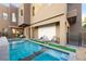 Inviting pool and spa with modern design and lounge area at 2824 Queens Courtyard Dr, Las Vegas, NV 89109