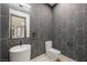 Modern powder room with stylish geometric wallpaper at 2824 Queens Courtyard Dr, Las Vegas, NV 89109