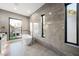 Modern bathroom with freestanding tub and large shower at 2824 Queens Courtyard Dr, Las Vegas, NV 89109