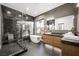 Modern bathroom with double vanity and large window at 2824 Queens Courtyard Dr, Las Vegas, NV 89109