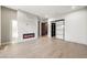 Modern bedroom with fireplace, walk-in closet, and hardwood floors at 2824 Queens Courtyard Dr, Las Vegas, NV 89109