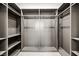 Large walk-in closet with ample shelving and hanging space at 2824 Queens Courtyard Dr, Las Vegas, NV 89109
