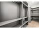 Large walk-in closet with ample shelving and hanging space at 2824 Queens Courtyard Dr, Las Vegas, NV 89109