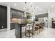 Modern kitchen with large island and stainless steel appliances at 2824 Queens Courtyard Dr, Las Vegas, NV 89109
