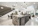 Open concept kitchen with large island and granite countertops at 2824 Queens Courtyard Dr, Las Vegas, NV 89109