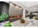 Living area with modern fireplace and kitchen views at 2824 Queens Courtyard Dr, Las Vegas, NV 89109