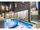 Luxury pool and spa with lounge chairs, perfect for relaxing evenings at 2824 Queens Courtyard Dr, Las Vegas, NV 89109