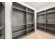 Large walk-in closet with ample shelving and hanging space at 2824 Queens Courtyard Dr, Las Vegas, NV 89109