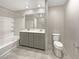 Modern bathroom with double vanity and tub at 3206 Brynley Ave, Henderson, NV 89044