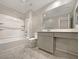 Well-lit bathroom with shower and single vanity at 3206 Brynley Ave, Henderson, NV 89044