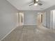 Spacious bedroom with ceiling fan and carpet at 3206 Brynley Ave, Henderson, NV 89044