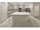 Modern kitchen with large island and stainless steel appliances at 3206 Brynley Ave, Henderson, NV 89044