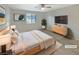 Bright main bedroom featuring a plush bed and ample space at 3206 Brynley Ave, Henderson, NV 89044