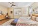 Main bedroom with king bed, wooden furniture, and a sitting area at 335 Alto Avec Ln, Henderson, NV 89011