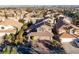 Aerial view of a two-story house in a residential neighborhood at 3362 Classic Bay Ln, Las Vegas, NV 89117