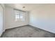 Bedroom with grey carpet and window with a view at 340 Silva Pl, Henderson, NV 89011