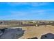 View of distant mountains and shopping center at 38 E Serene Ave # 416, Las Vegas, NV 89123