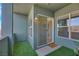 Private balcony with artificial turf and access to interior at 38 E Serene Ave # 416, Las Vegas, NV 89123