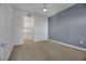 Bedroom with grey wall and carpet flooring at 38 E Serene Ave # 416, Las Vegas, NV 89123