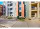 Modern building exterior with walkway and landscaping at 38 E Serene Ave # 416, Las Vegas, NV 89123