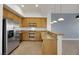 Modern kitchen with stainless steel appliances and granite counters at 38 E Serene Ave # 416, Las Vegas, NV 89123