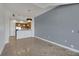Open living room, kitchen, and tile floors at 38 E Serene Ave # 416, Las Vegas, NV 89123