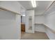 Spacious walk-in closet with mirrored doors and shelving at 38 E Serene Ave # 416, Las Vegas, NV 89123