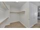 Large walk-in closet with ample shelving and hanging space at 38 E Serene Ave # 416, Las Vegas, NV 89123