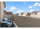 Private patio with seating area and community view at 4368 Latitude Valley Ct, North Las Vegas, NV 89084