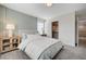 Bedroom with walk-in closet and wood nightstands at 639 Morbucks Ln # 1044, Henderson, NV 89011