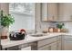 Modern kitchen with white cabinets and a stylish sink at 639 Morbucks Ln # 1045, Henderson, NV 89011