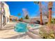 Inviting kidney shaped pool with spa at 7096 Wild Wave Dr, Las Vegas, NV 89131