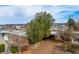 Aerial view of the home showcasing mature trees, driveway, and neighborhood at 71 E Atlantic Ave, Henderson, NV 89015