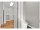 Small bathroom with toilet and access to closet at 8075 Palm Cove Ct, Las Vegas, NV 89129