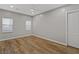 Inviting bedroom with wood floors and natural light, offering a cozy and comfortable atmosphere at 8075 Palm Cove Ct, Las Vegas, NV 89129