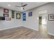 Bedroom with wood floors and views into the living area at 8075 Palm Cove Ct, Las Vegas, NV 89129