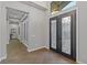 Bright entry featuring hardwood floors and an open concept at 8075 Palm Cove Ct, Las Vegas, NV 89129