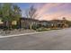 Contemporary home with stone accents and lush landscaping at 8075 Palm Cove Ct, Las Vegas, NV 89129