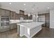 Kitchen features stainless steel appliances and ample counter space at 8075 Palm Cove Ct, Las Vegas, NV 89129